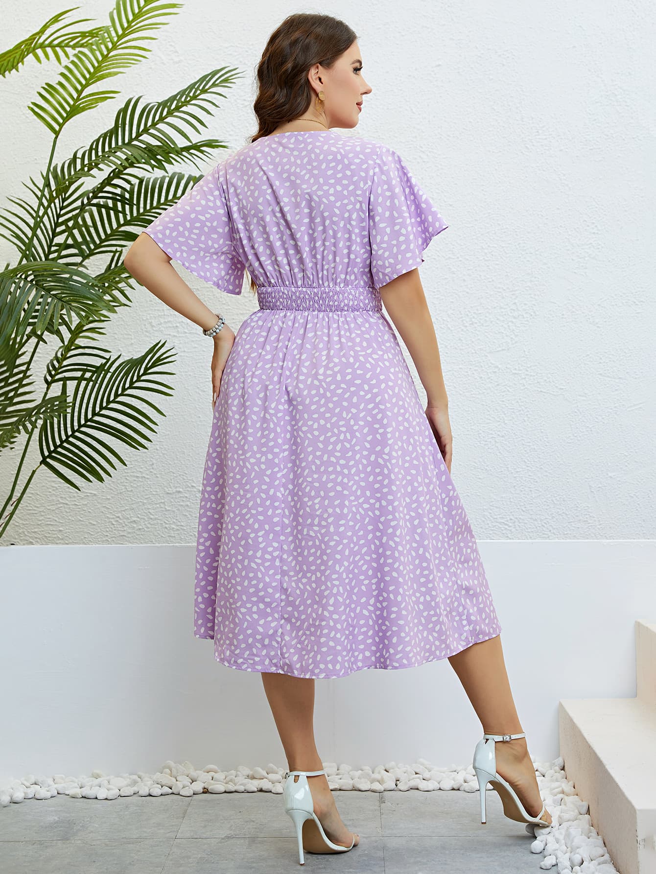 Honey Plus Size Printed Smocked Waist Surplice Dress - Premium Dresses from Trendsi - Just $32.99! Shop now at Handbags Specialist Headquarter