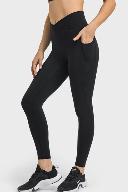 Millennia V-Waist Yoga Leggings with Pockets - Premium Leggings from Trendsi - Just $59.76! Shop now at Handbags Specialist Headquarter