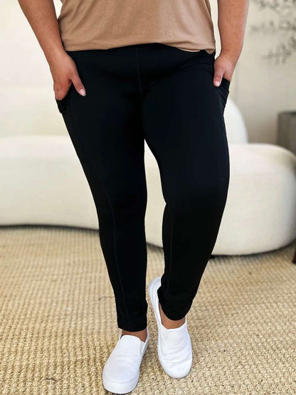 Wide Waistband Sports Leggings - Premium Leggings from Trendsi - Just $24! Shop now at Handbags Specialist Headquarter