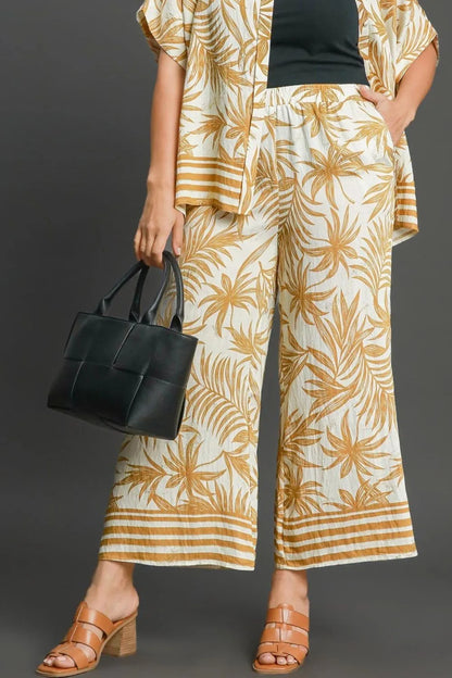 Umgee Full Size Tropical Print Wide Leg Pants Plus Size - Premium Dresses from Trendsi - Just $44.99! Shop now at Handbags Specialist Headquarter