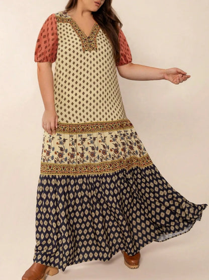 Plus Size Ruched Printed Short Sleeve Midi Dress - Premium Dresses from Trendsi - Just $52.99! Shop now at Handbags Specialist Headquarter