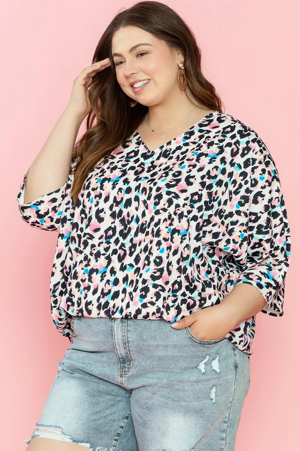 Plus Size Leopard V-Neck Three-Quarter Sleeve Blouse - Premium Plus Size Shirts from Trendsi - Just $24.32! Shop now at Handbags Specialist Headquarter