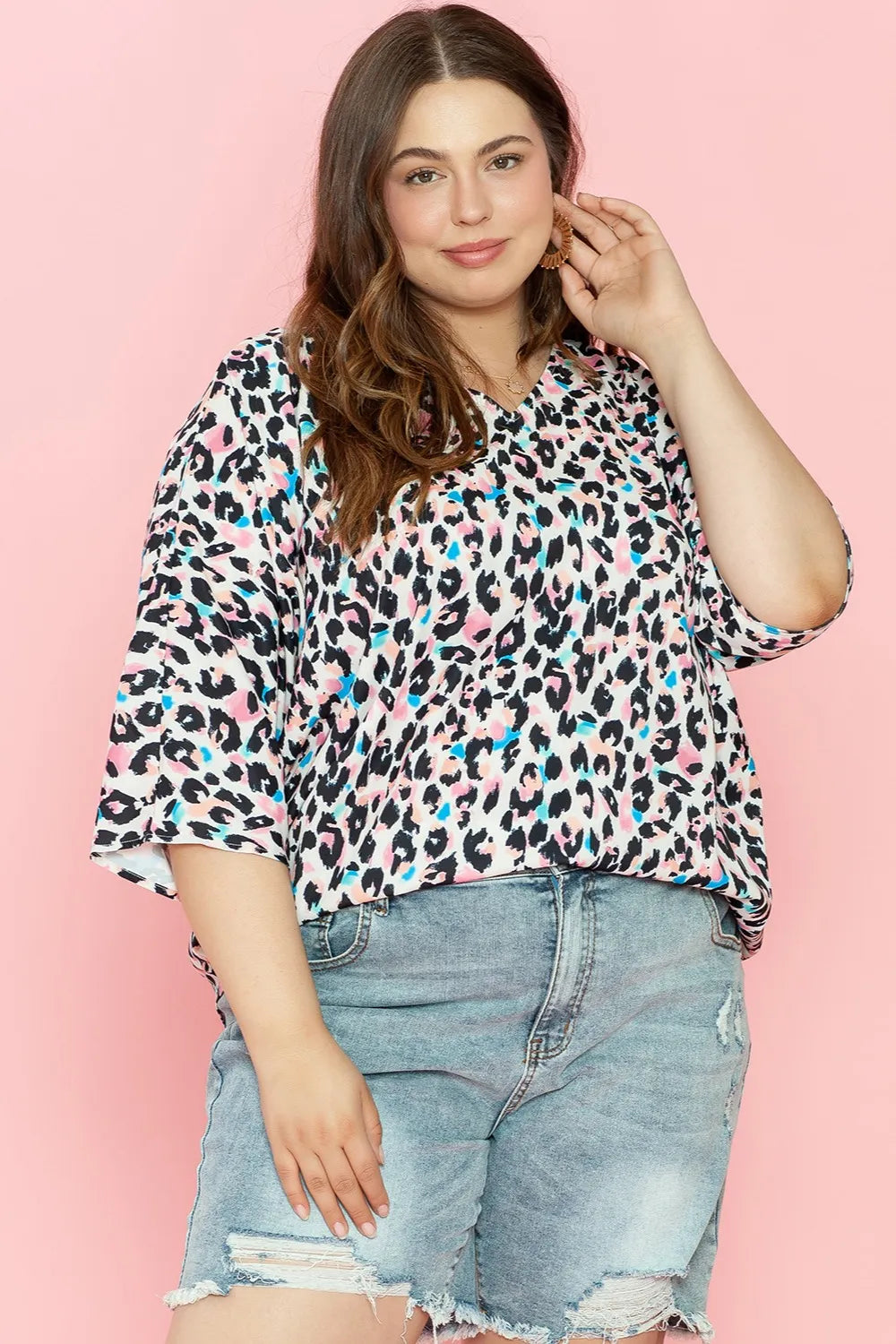 Plus Size Leopard V-Neck Three-Quarter Sleeve Blouse - Premium Plus Size Shirts from Trendsi - Just $24.32! Shop now at Handbags Specialist Headquarter