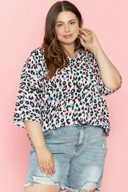 Plus Size Leopard V-Neck Three-Quarter Sleeve Blouse - Premium Plus Size Shirts from Trendsi - Just $24.32! Shop now at Handbags Specialist Headquarter