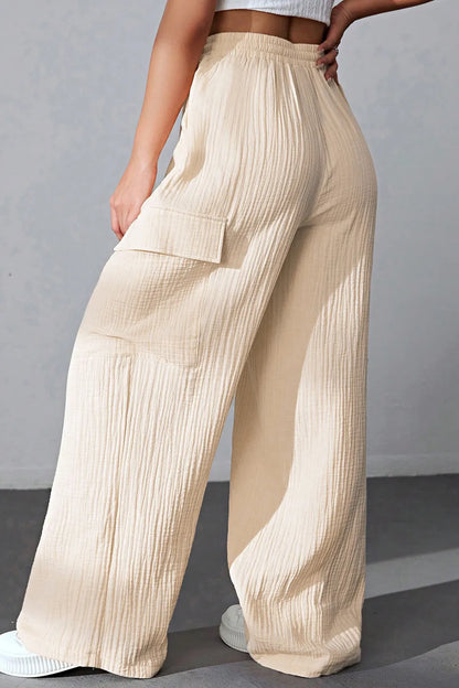 Drawstring Pocketed Wide Leg Pants - Premium Women Pants from Trendsi - Just $40.99! Shop now at Handbags Specialist Headquarter