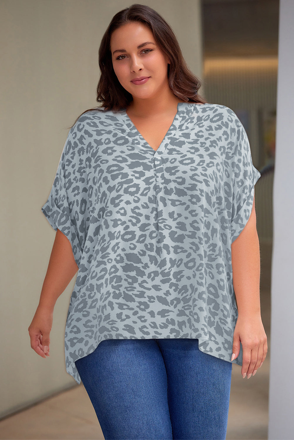 Plus Size Printed Notched Neck Half Sleeve Top - Premium Plus Size Shirts from Trendsi - Just $28! Shop now at Handbags Specialist Headquarter