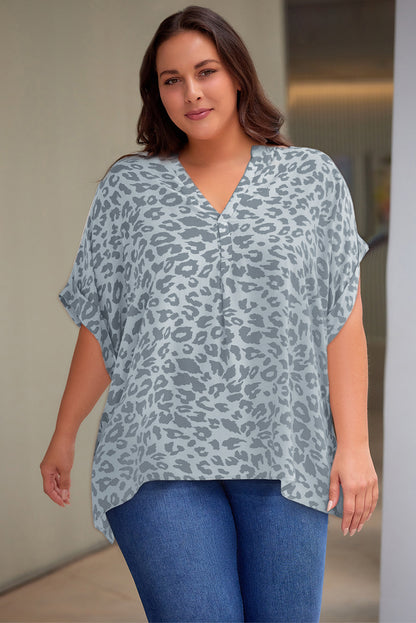 Plus Size Printed Notched Neck Half Sleeve Top - Premium Plus Size Shirts from Trendsi - Just $28! Shop now at Handbags Specialist Headquarter