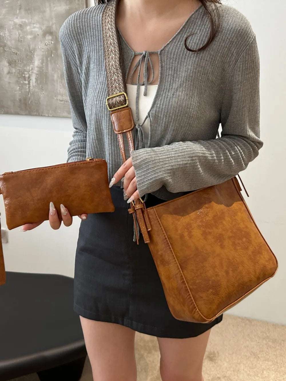 PU Leather Adjustable Strap Crossbody Bag with Pouch - Premium Crossbody Bag from Trendsi - Just $31.99! Shop now at Handbags Specialist Headquarter