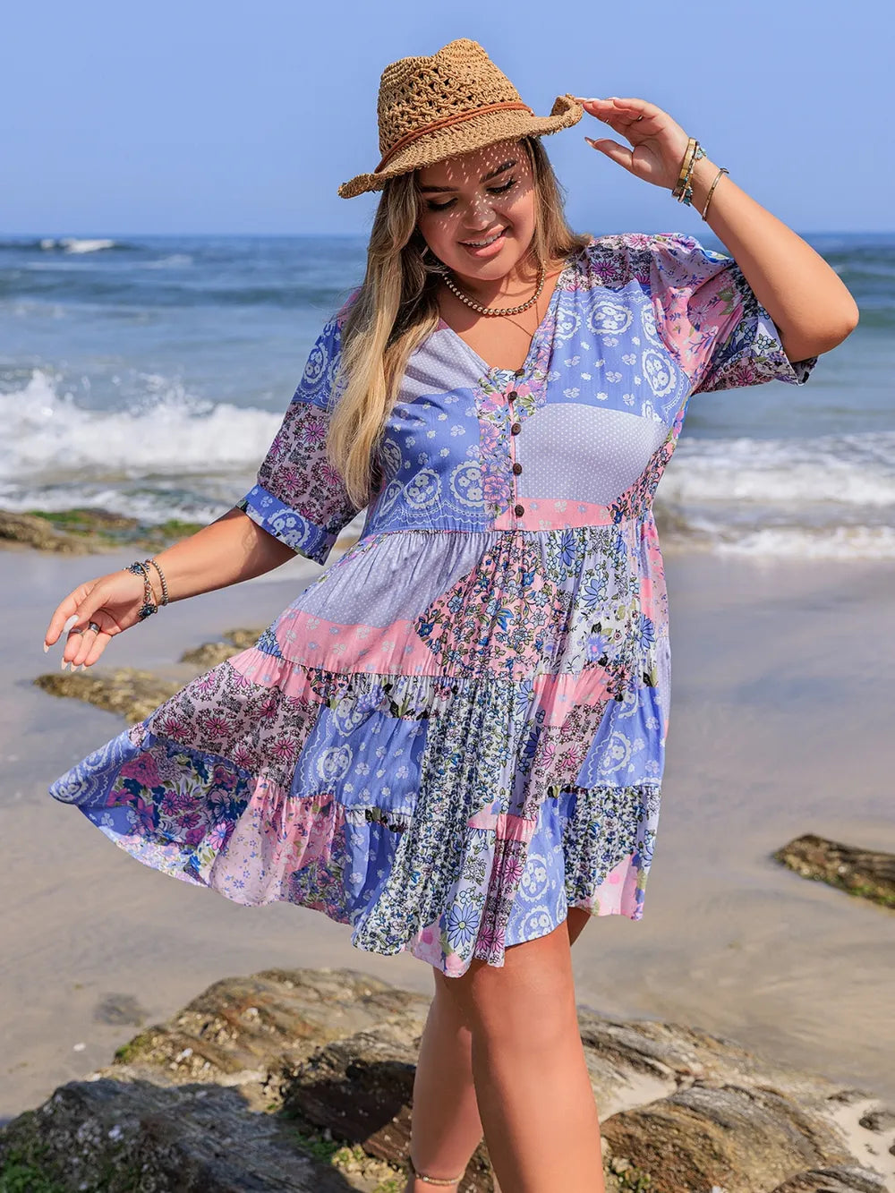 Plus Size Printed V-Neck Tiered Mini Dress - Premium Dresses from Trendsi - Just $33.99! Shop now at Handbags Specialist Headquarter