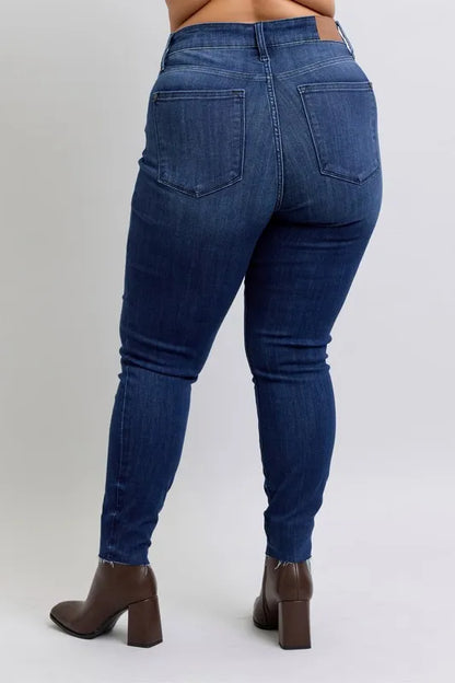 Judy Blue Full Size Mid Rise Skinny Jeans with Raw Hem Plus Size - Premium Women / Jeans & Denim from Trendsi - Just $55.99! Shop now at Handbags Specialist Headquarter