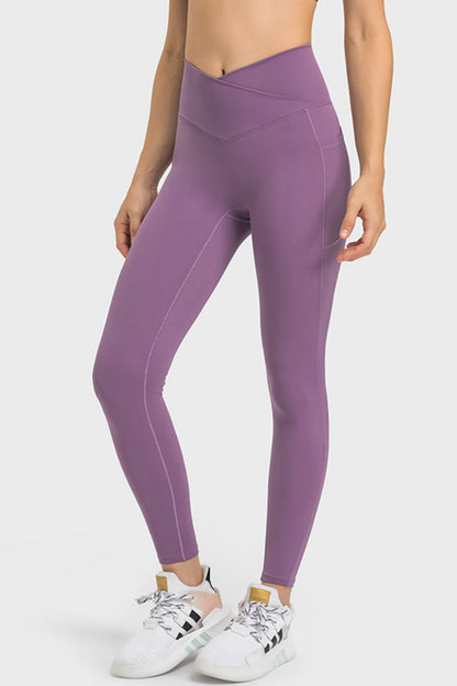 Millennia V-Waist Yoga Leggings with Pockets - Premium Leggings from Trendsi - Just $59.76! Shop now at Handbags Specialist Headquarter