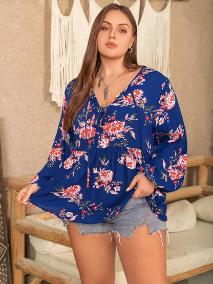 Plus Size Printed Tie Neck Balloon Sleeve Blouse - Premium Plus Size Shirts from Trendsi - Just $28! Shop now at Handbags Specialist Headquarter