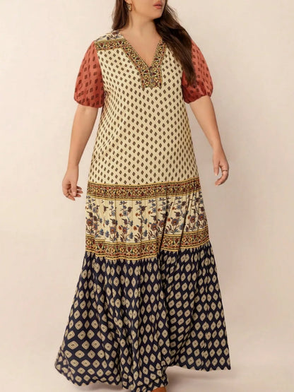 Plus Size Ruched Printed Short Sleeve Midi Dress - Premium Dresses from Trendsi - Just $52.99! Shop now at Handbags Specialist Headquarter