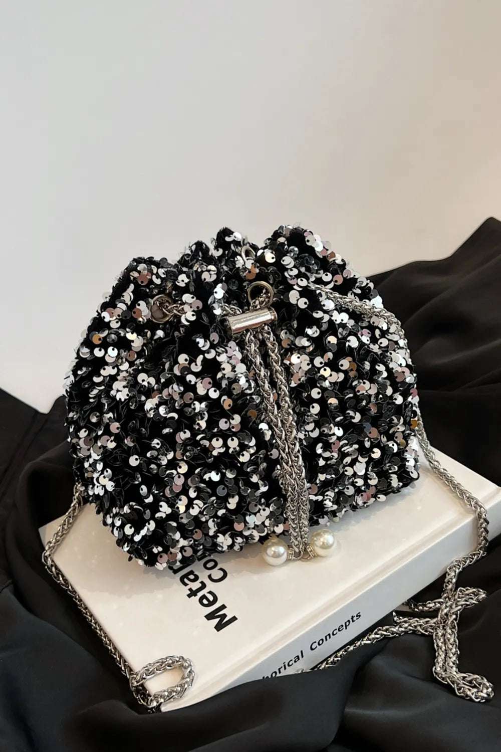 Sequin Chain Drawstring Bucket Bag - Premium Crossbody Bag from Trendsi - Just $21.99! Shop now at Handbags Specialist Headquarter