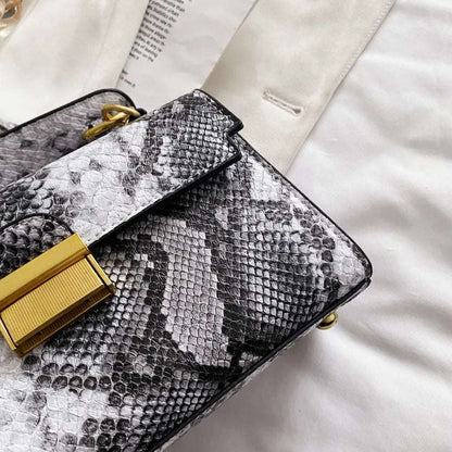 PU Leather Snakeskin Print Crossbody Bag - Premium Crossbody Bag from Trendsi - Just $35.99! Shop now at Handbags Specialist Headquarter
