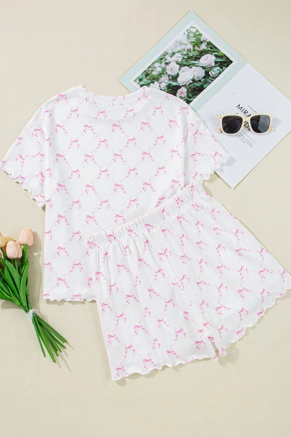Bow Print Lettuce Trim Round Neck Top and Shorts Lounge Set - Premium Sleepwear from Trendsi - Just $32.14! Shop now at Handbags Specialist Headquarter
