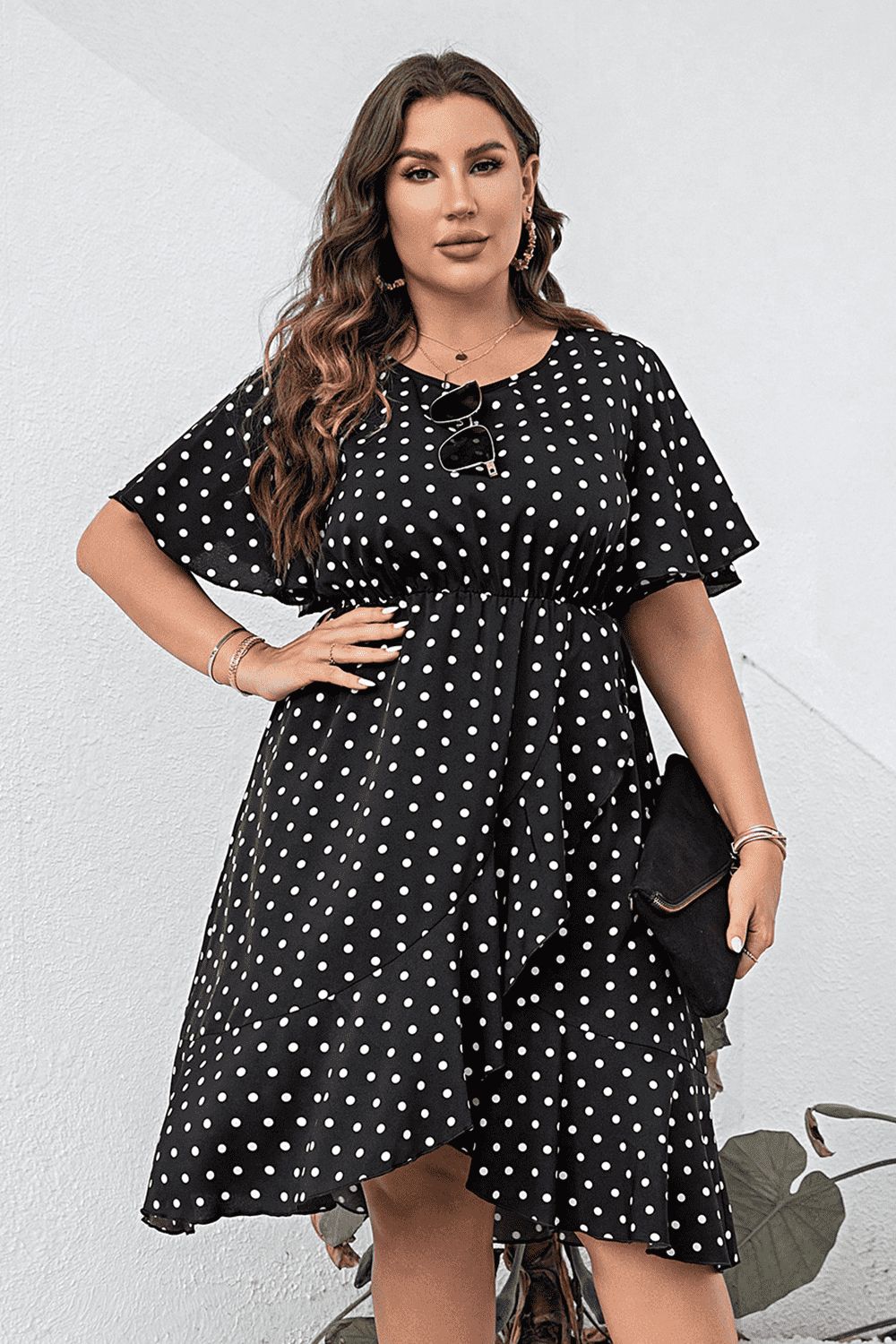 Plus Size Polka Dot Flutter Sleeve Dress - Premium Dresses from Trendsi - Just $46.99! Shop now at Handbags Specialist Headquarter