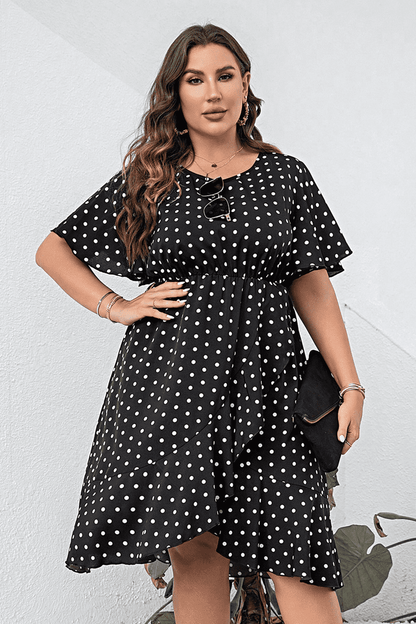 Plus Size Polka Dot Flutter Sleeve Dress - Premium Dresses from Trendsi - Just $46.99! Shop now at Handbags Specialist Headquarter