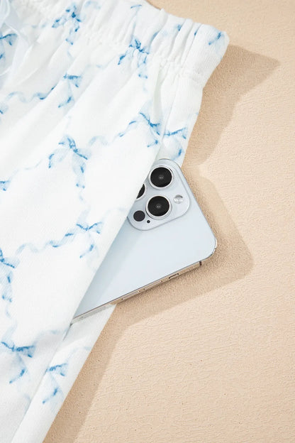 Printed Round Neck Top and Shorts Two-Piece Lounge Set - Premium Sleepwear from Trendsi - Just $39.99! Shop now at Handbags Specialist Headquarter