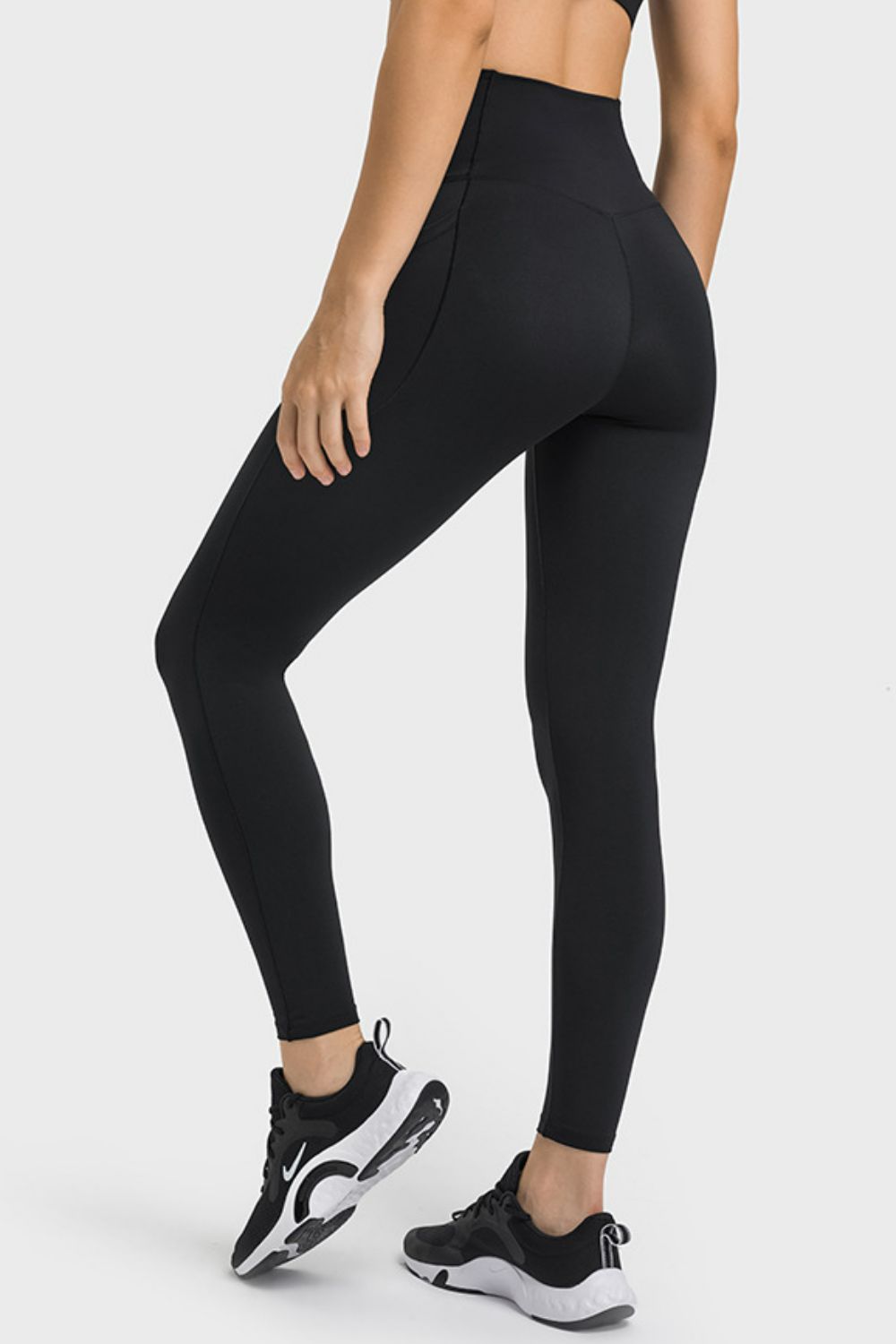 Millennia V-Waist Yoga Leggings with Pockets - Premium Leggings from Trendsi - Just $59.76! Shop now at Handbags Specialist Headquarter