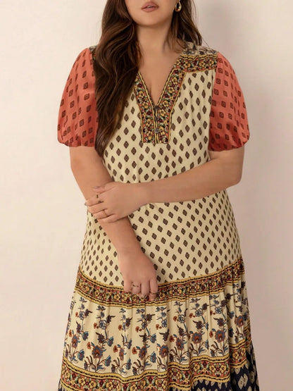 Plus Size Ruched Printed Short Sleeve Midi Dress - Premium Dresses from Trendsi - Just $52.99! Shop now at Handbags Specialist Headquarter