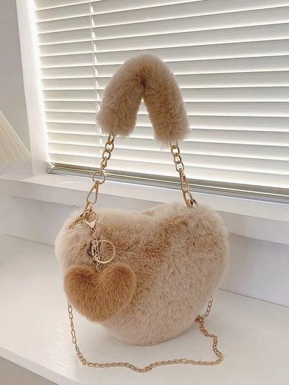 Heart Shape Faux Fur Handbag - Premium handbags from Trendsi - Just $19.99! Shop now at Handbags Specialist Headquarter