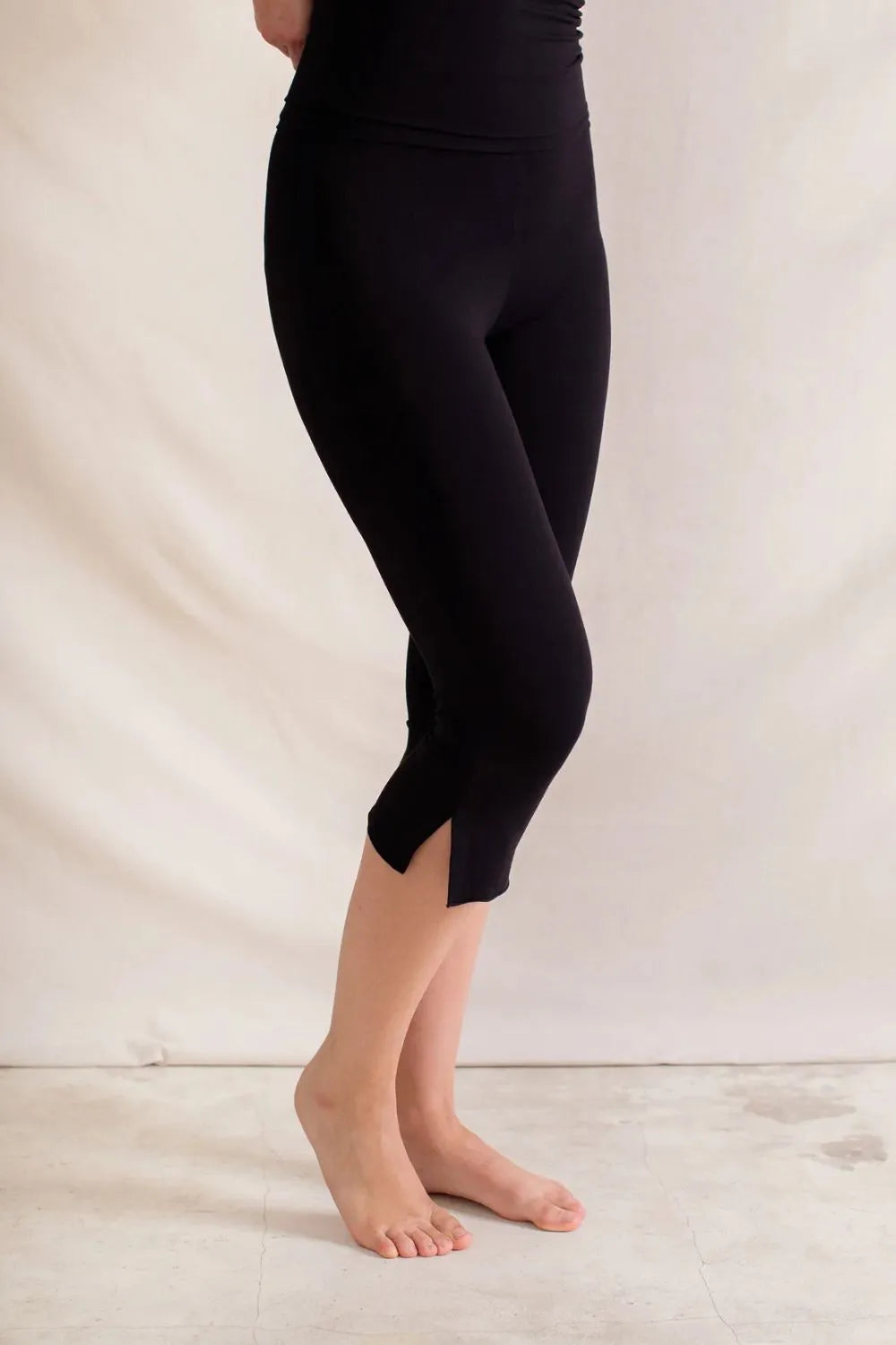 Side Slit Capris Leggings - Premium Leggings from Trendsi - Just $29.40! Shop now at Handbags Specialist Headquarter