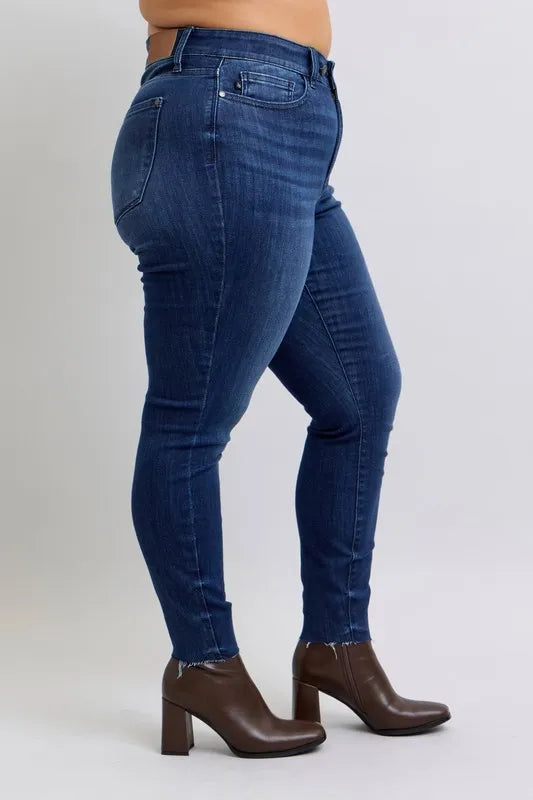 Judy Blue Full Size Mid Rise Skinny Jeans with Raw Hem Plus Size - Premium Women / Jeans & Denim from Trendsi - Just $55.99! Shop now at Handbags Specialist Headquarter