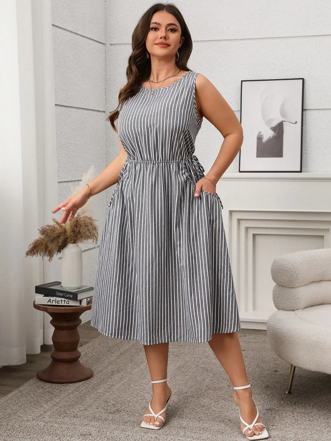 Plus Size Striped Round Neck Sleeveless Dress - Premium Dresses from Trendsi - Just $40.99! Shop now at Handbags Specialist Headquarter