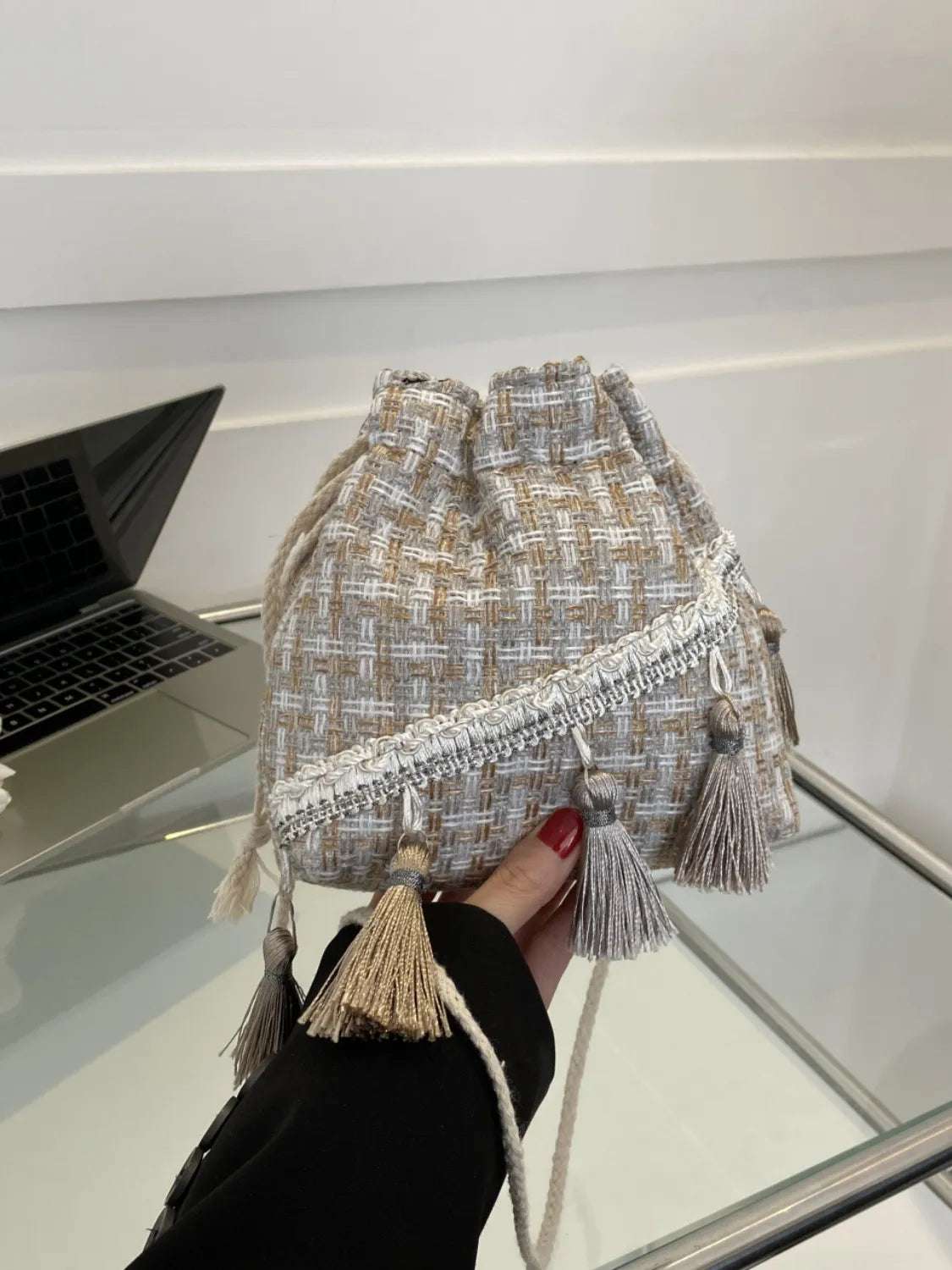 Tassel Trim Woven Bucket Crossbody Bag - Premium Crossbody Bag from Trendsi - Just $14.99! Shop now at Handbags Specialist Headquarter