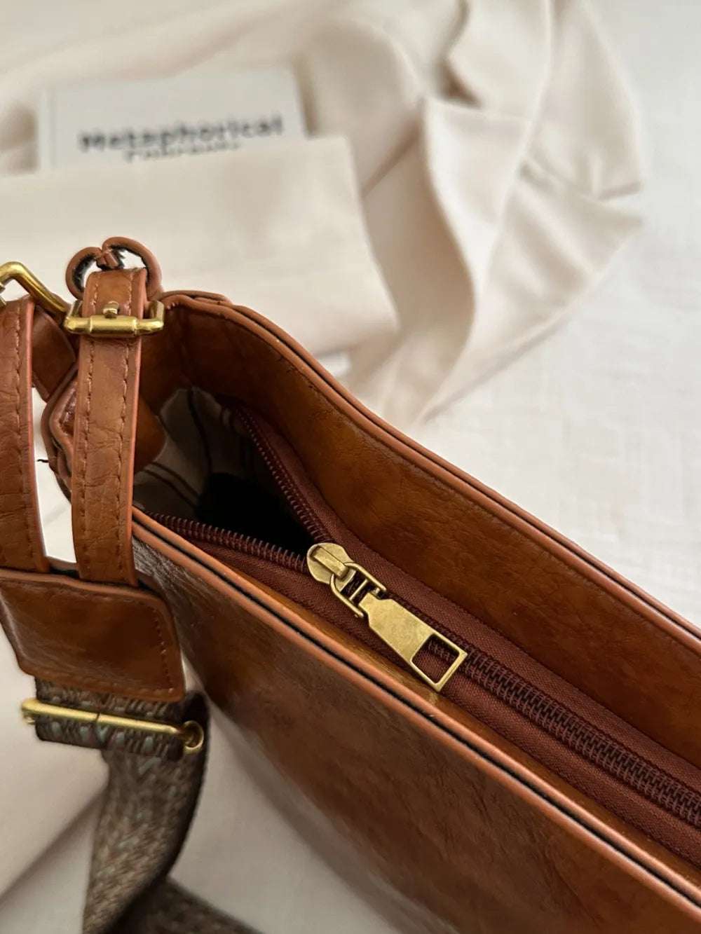 PU Leather Adjustable Strap Crossbody Bag with Pouch - Premium Crossbody Bag from Trendsi - Just $31.99! Shop now at Handbags Specialist Headquarter