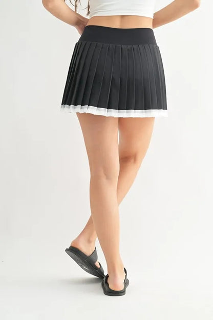 MONO B Court Charm Pleated Skort - Premium Skirts from Trendsi - Just $38.99! Shop now at Handbags Specialist Headquarter
