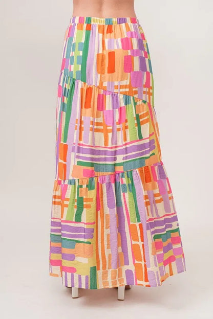 And The Why Asymmetric Geo Printed Tiered Maxi Skirt - Premium Skirts from Trendsi - Just $47.99! Shop now at Handbags Specialist Headquarter