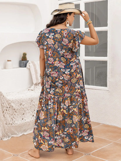 Plus Size Ruffled Printed Cap Sleeve Dress - Premium Dresses from Trendsi - Just $43.99! Shop now at Handbags Specialist Headquarter