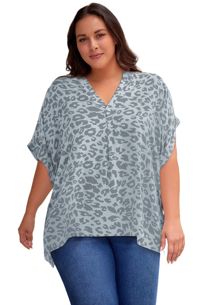 Plus Size Printed Notched Neck Half Sleeve Top - Premium Plus Size Shirts from Trendsi - Just $28! Shop now at Handbags Specialist Headquarter