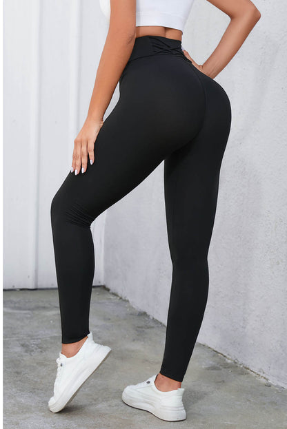 Crisscross Detail Wide Waistband Leggings - Premium Leggings from Trendsi - Just $38.19! Shop now at Handbags Specialist Headquarter