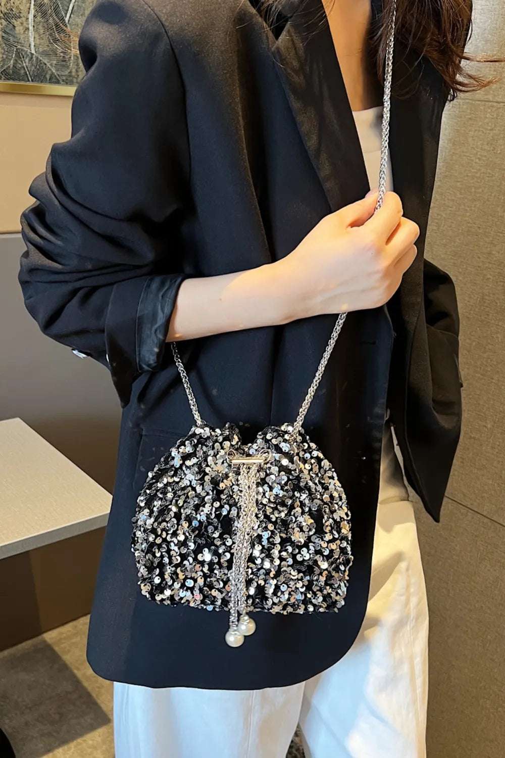 Sequin Chain Drawstring Bucket Bag - Premium Crossbody Bag from Trendsi - Just $21.99! Shop now at Handbags Specialist Headquarter