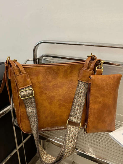 PU Leather Adjustable Strap Crossbody Bag with Pouch - Premium Crossbody Bag from Trendsi - Just $31.99! Shop now at Handbags Specialist Headquarter