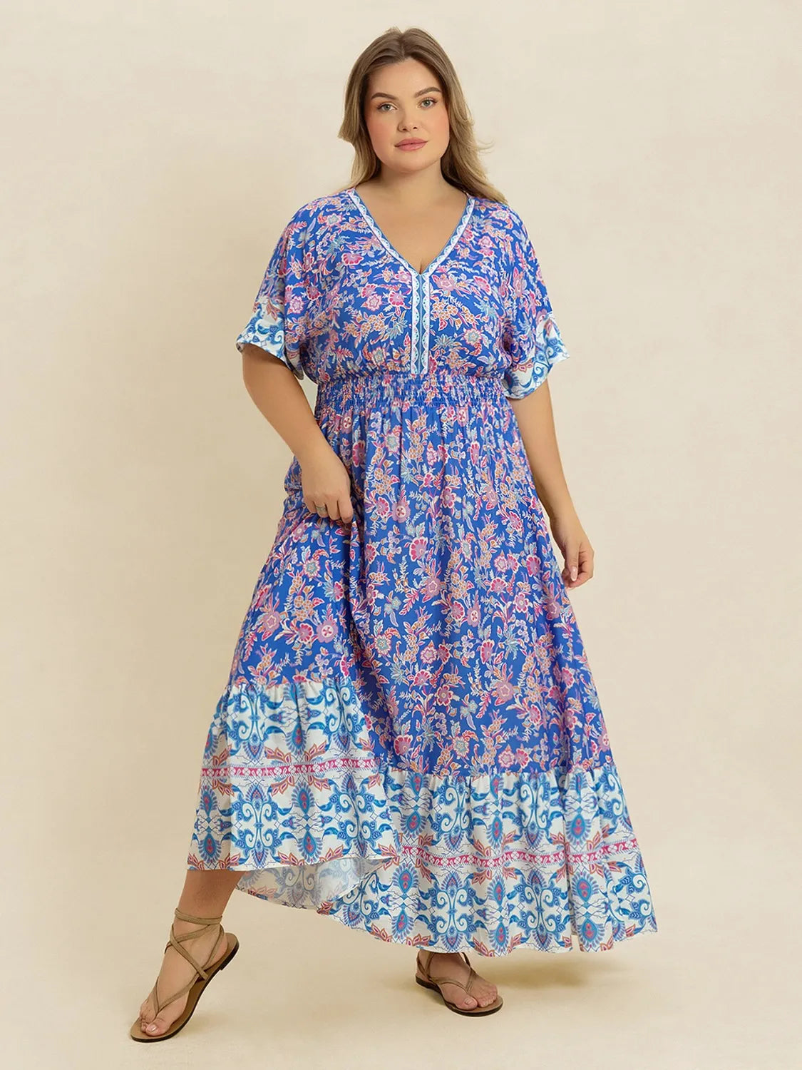Plus Size Smocked Printed Half Sleeve Midi Dress - Premium Dresses from Trendsi - Just $43.99! Shop now at Handbags Specialist Headquarter
