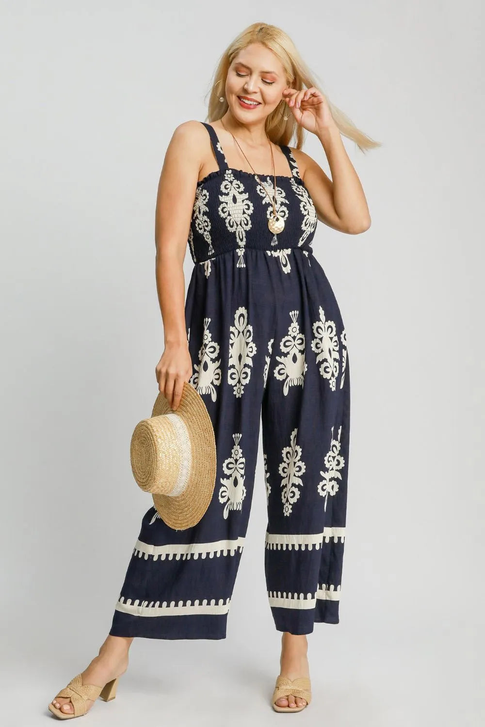 Umgee Full Size Smocked Printed Wide Leg Jumpsuit Plus Size - Premium Dresses from Trendsi - Just $55.99! Shop now at Handbags Specialist Headquarter
