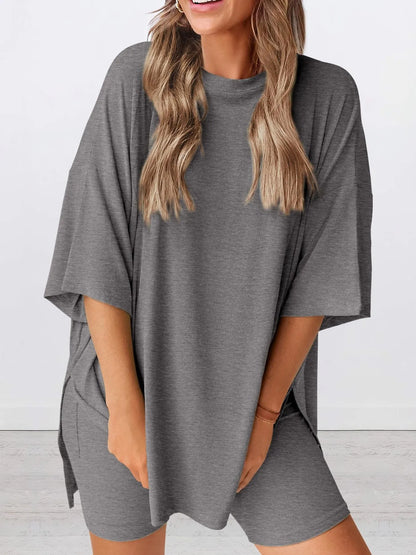 Full Size Oversized Slit Round Neck Top and Shorts Lounge Set Plus Size - Premium Sleepwear from Trendsi - Just $28.99! Shop now at Handbags Specialist Headquarter