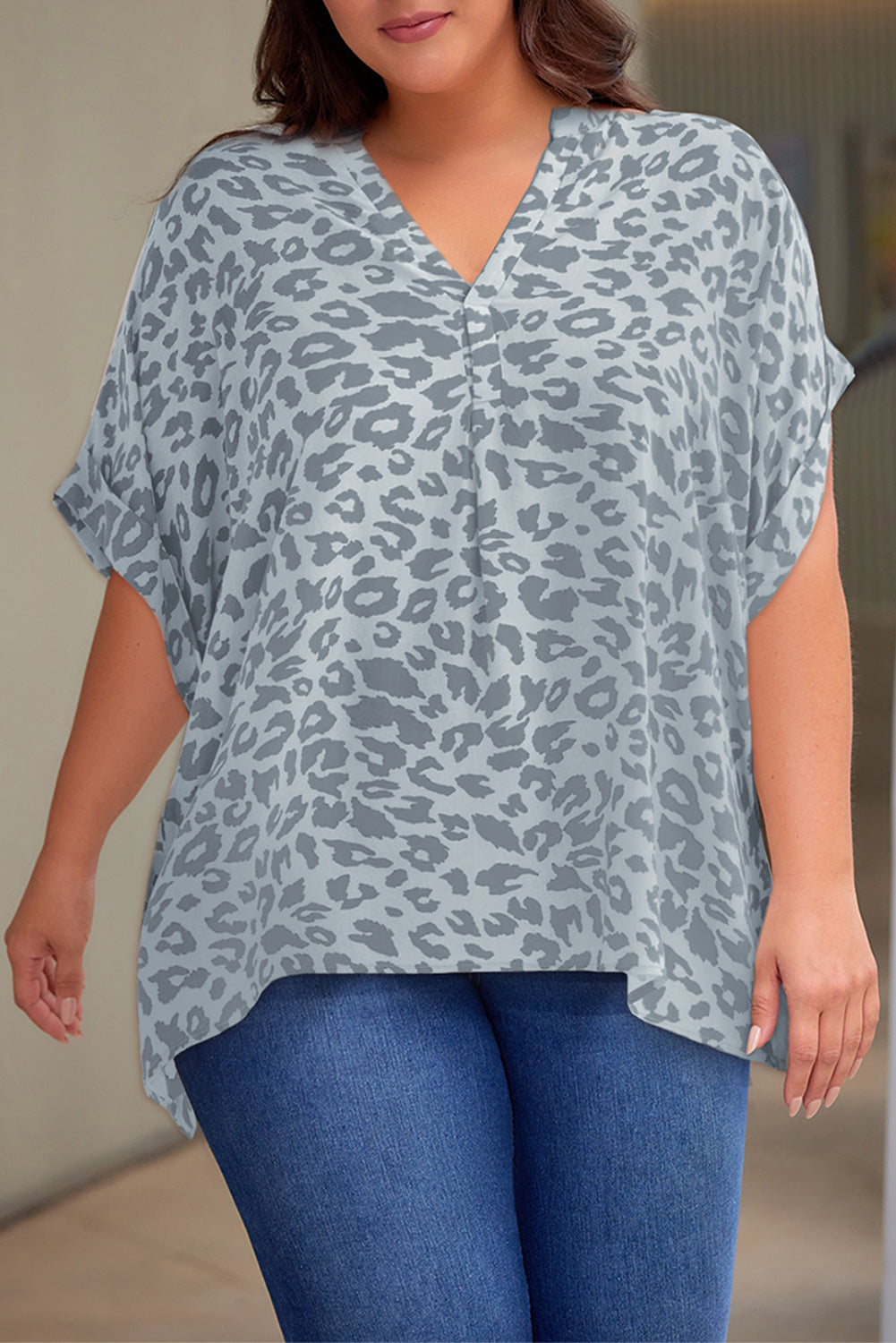 Plus Size Printed Notched Neck Half Sleeve Top - Premium Plus Size Shirts from Trendsi - Just $28! Shop now at Handbags Specialist Headquarter