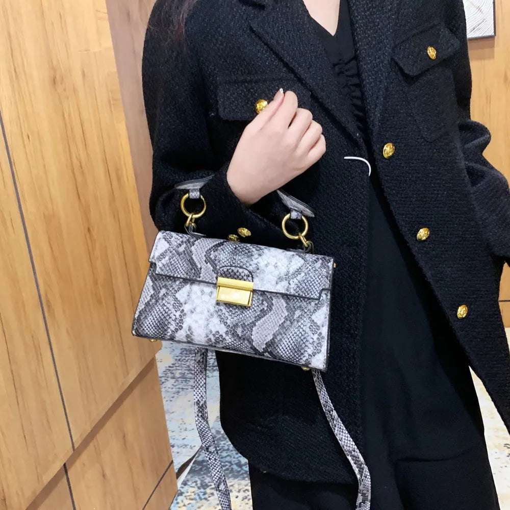 PU Leather Snakeskin Print Crossbody Bag - Premium Crossbody Bag from Trendsi - Just $35.99! Shop now at Handbags Specialist Headquarter