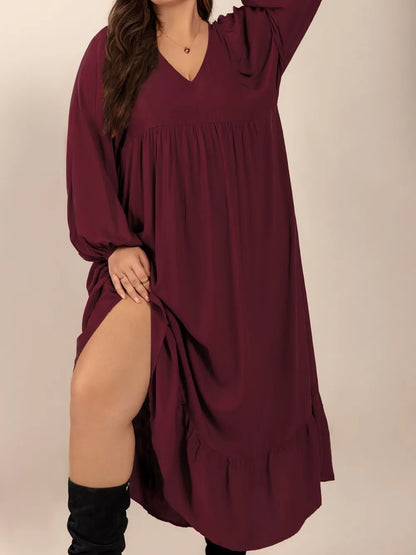 Plus Size Ruffled Hem V-Neck Balloon Sleeve Dress - Premium Dresses from Trendsi - Just $38.99! Shop now at Handbags Specialist Headquarter