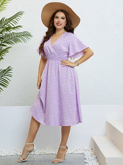 Honey Plus Size Printed Smocked Waist Surplice Dress - Premium Dresses from Trendsi - Just $32.99! Shop now at Handbags Specialist Headquarter