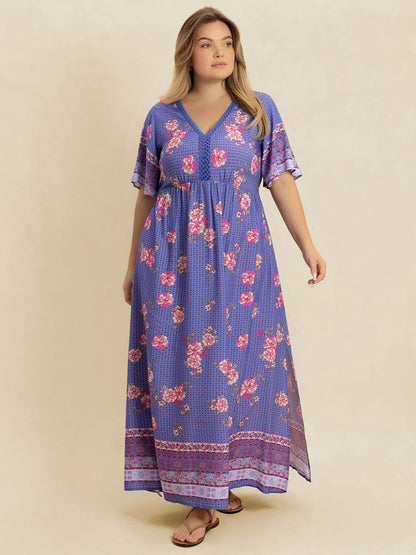 Plus Size Printed V-Neck Flutter Sleeve Dress - Premium Dresses from Trendsi - Just $38.99! Shop now at Handbags Specialist Headquarter