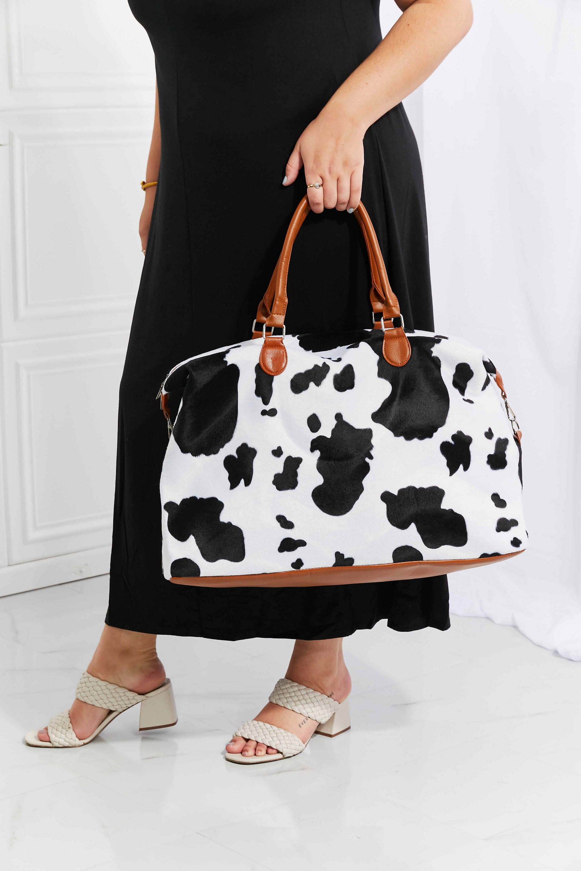 Animal Print Plush Weekender Bag - Premium Weekender Bag from Trendsi - Just $54.99! Shop now at Handbags Specialist Headquarter