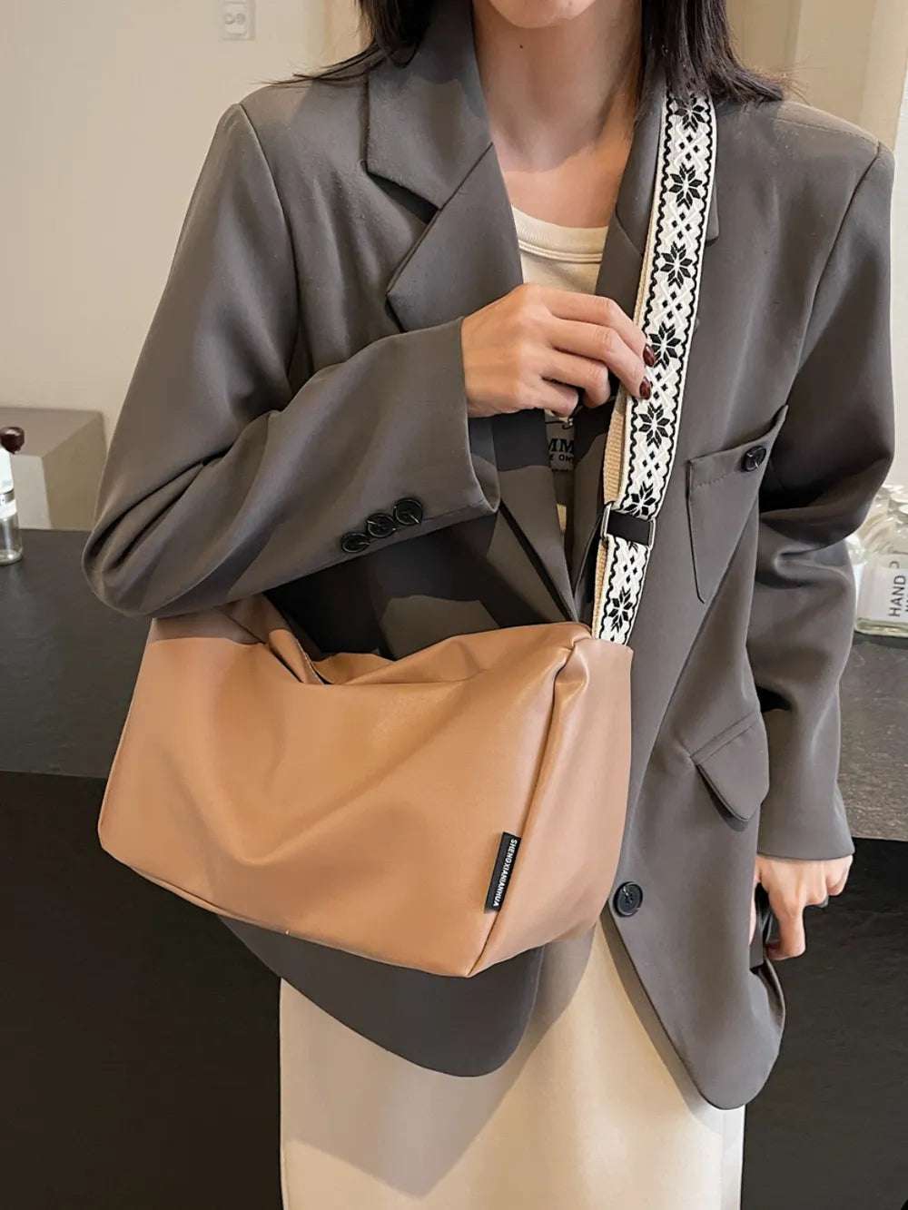 PU Leather Adjustable Strap Crossbody Bag - Premium Crossbody Bag from Trendsi - Just $26.99! Shop now at Handbags Specialist Headquarter