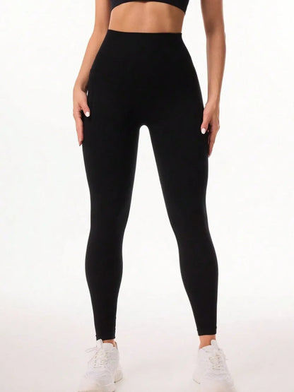 Pocketed High Waist Active Leggings - Premium Leggings from Trendsi - Just $40.35! Shop now at Handbags Specialist Headquarter