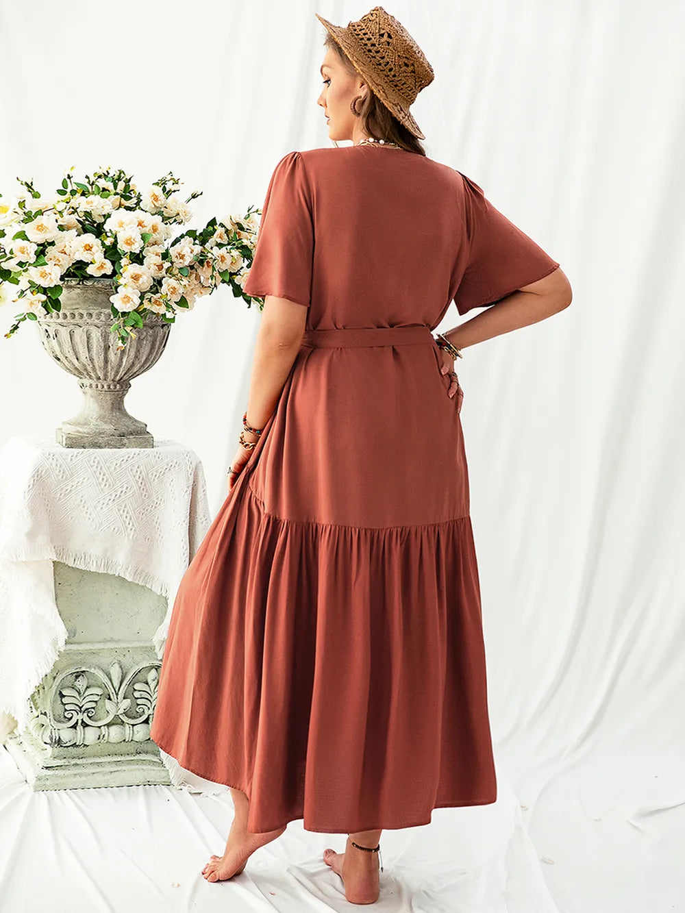 Plus Size V-Neck Flutter Sleeve Midi Dress - Premium Dresses from Trendsi - Just $46.99! Shop now at Handbags Specialist Headquarter